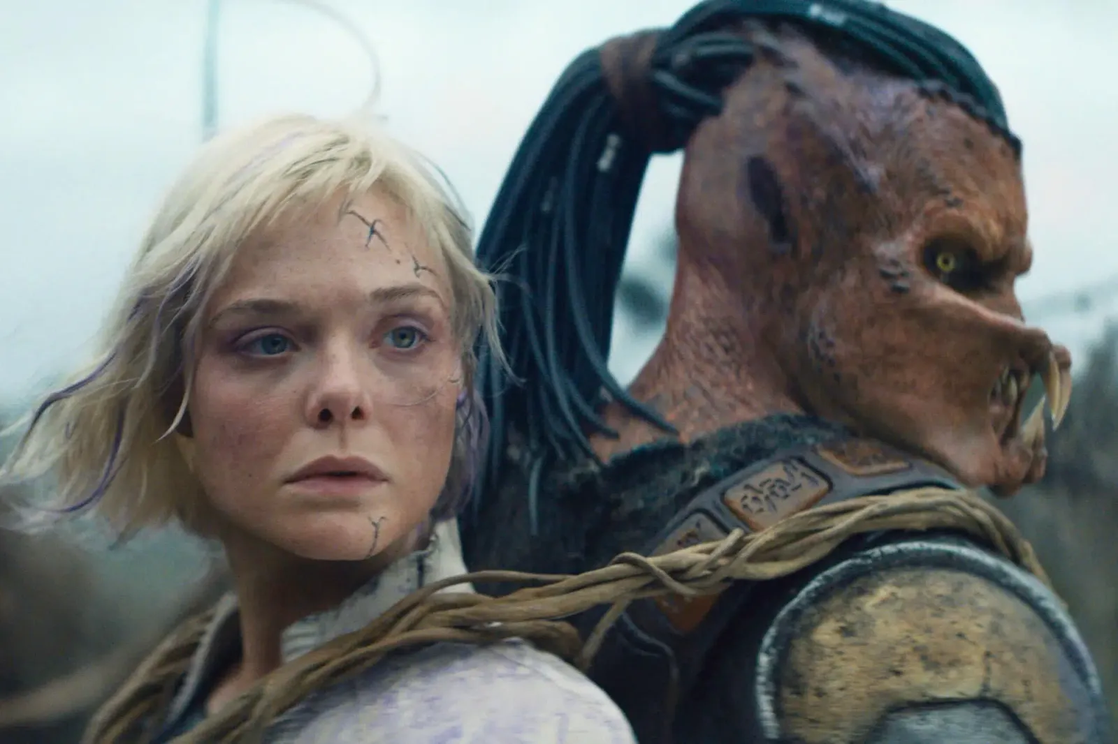 Predator: Badlands' review: Elle Fanning supplies humor, soul to sequel - Los Angeles Times