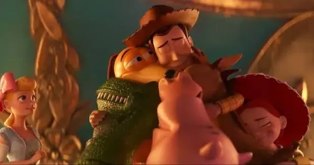 Woody is sharing a group hug with his family. 👪 🤗 #toystory4